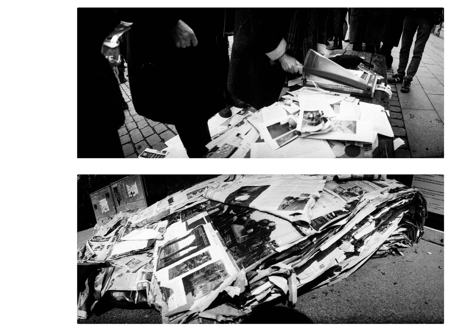 Two black-and-white panoramic photographs arranged vertically. The upper image shows people gathered around a table covered with scattered newspapers and printed pages on a city pavement, with a paper-cutting machine among them. The lower image shows a large, uneven pile of newspapers and printed material lying directly on the ground. Both photographs are taken from low viewpoints, with the papers dominating the foreground.