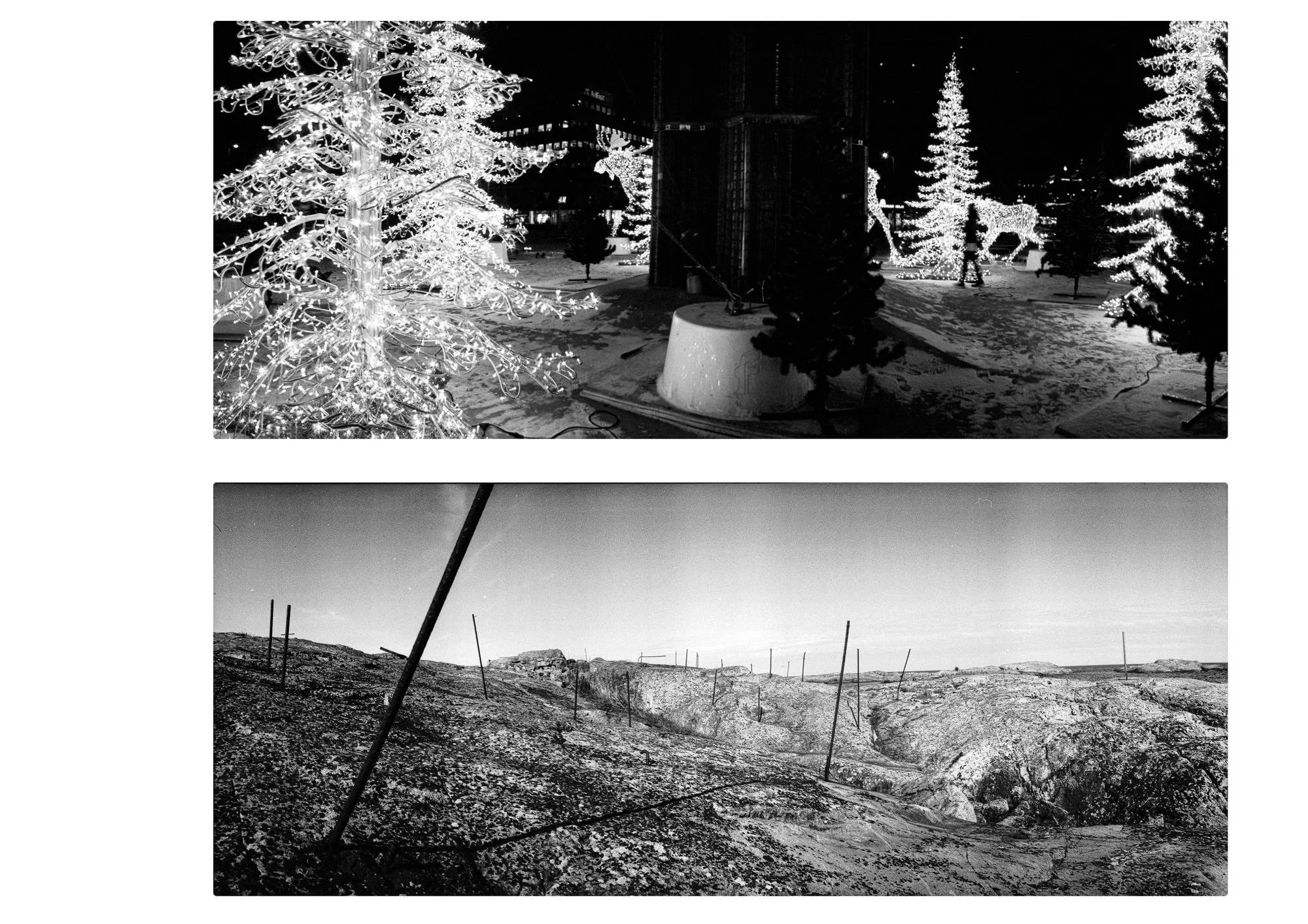 Two black-and-white panoramic photographs arranged vertically. The upper image shows a nighttime urban square with brightly illuminated artificial Christmas trees and a reindeer-shaped light decoration, surrounded by darkness and patches of snow. The lower image shows a bare, rocky landscape crossed by a line of thin, irregularly leaning fence posts beneath an open sky.