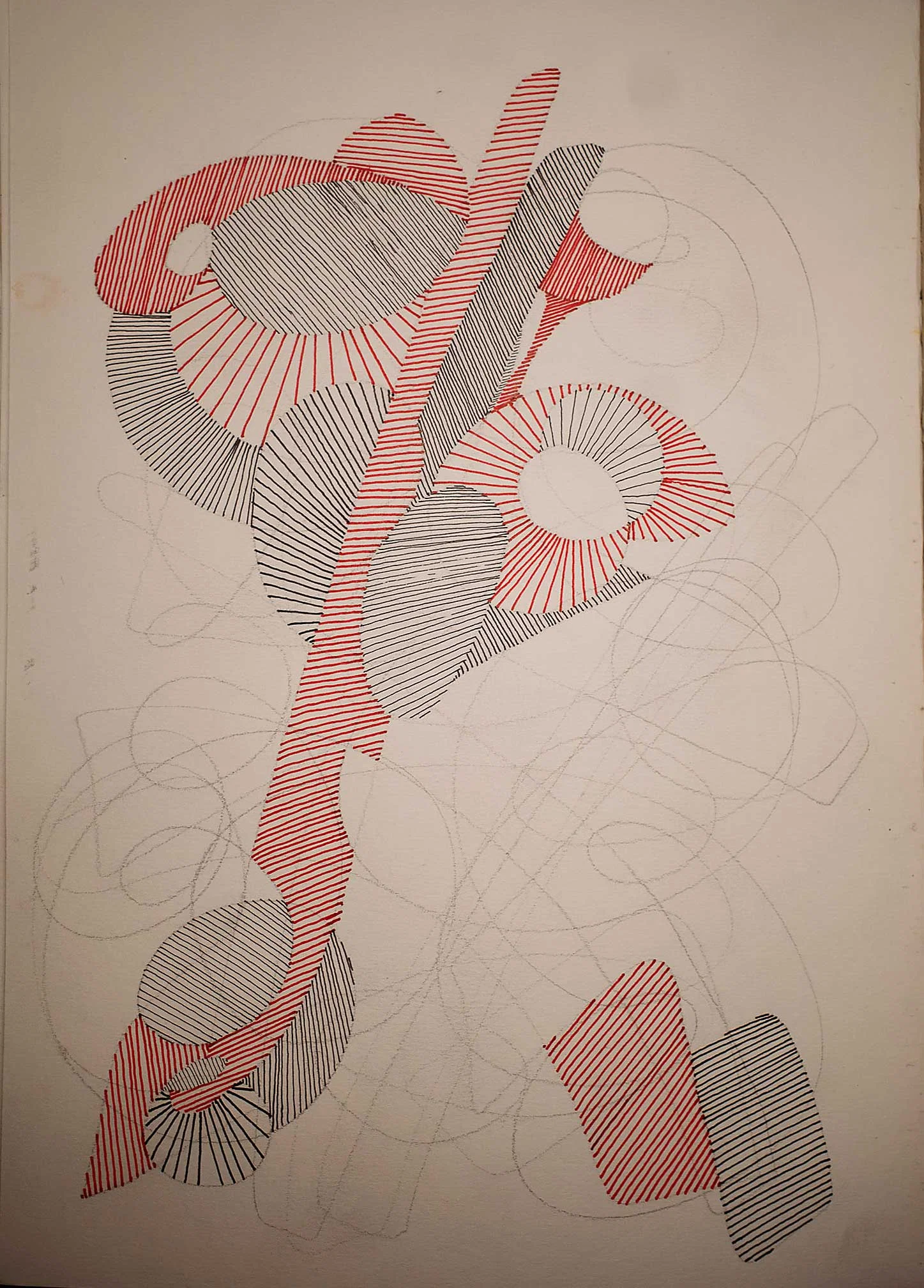 An abstract drawing of curved and elongated shapes filled with fine red and black parallel lines. The densest forms occupy the upper half, with smaller striped shapes below. Faint looping pencil lines remain visible across the open areas of paper.