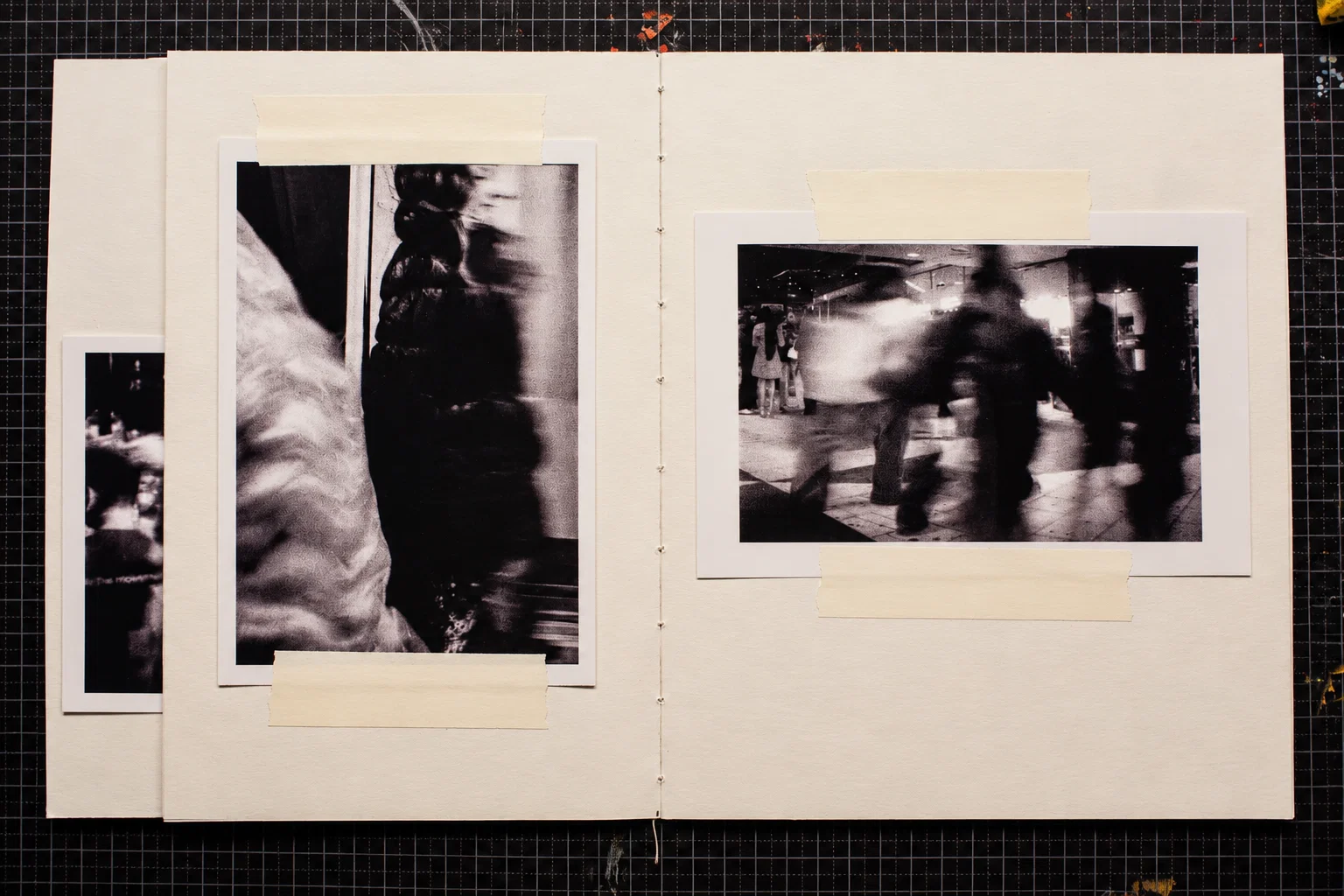 A vertical photograph on the left shows closely overlapping, blurred figures and contrasting light and dark clothing. On the right, people walking through a public interior appear as streaks and indistinct silhouettes.